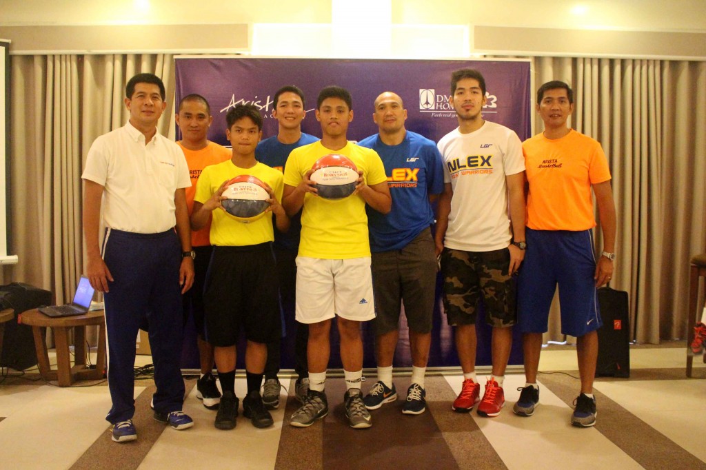 The graduates pose together with VIPs