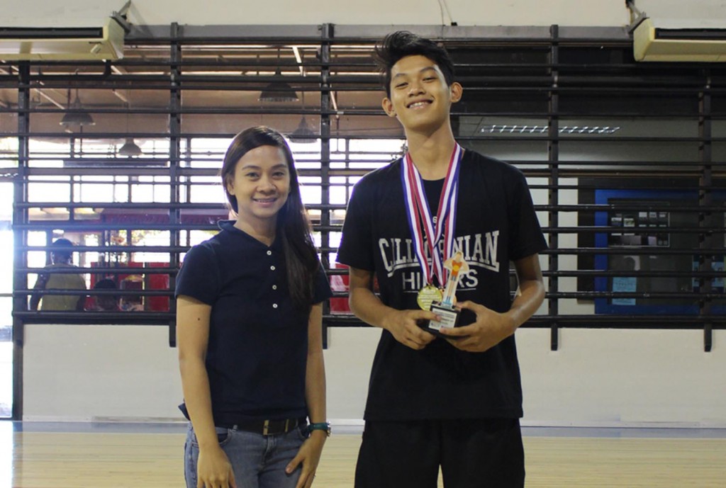 Cj Gracilla poses with DMCI Homes Marketing Assistant manager, April Tovillo-Ponte