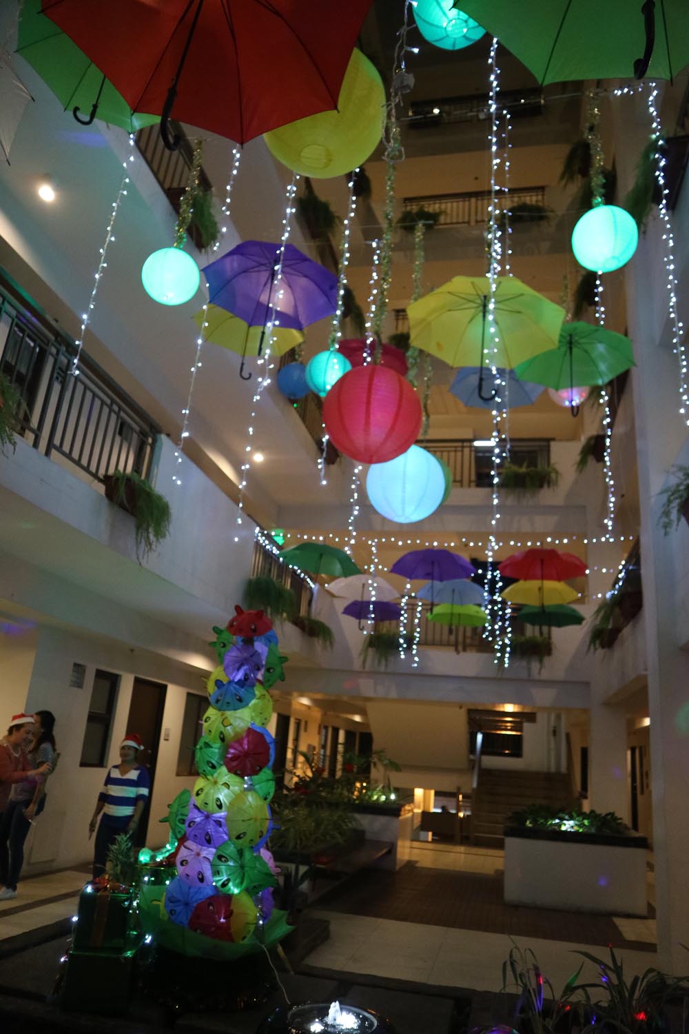 Hanging umbrellas, Christmas lights, and lanterns