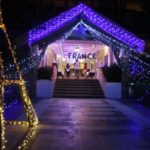 House decorated with Christmas lights, parol, and balloons