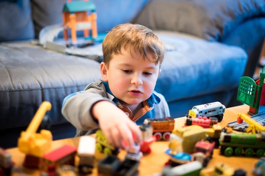 child playing his toy child playing his toy