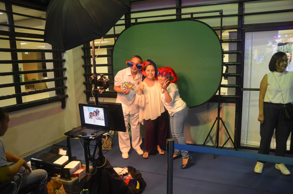 DMCI Homes' Homeowners having fun striking poses at the photo booth.