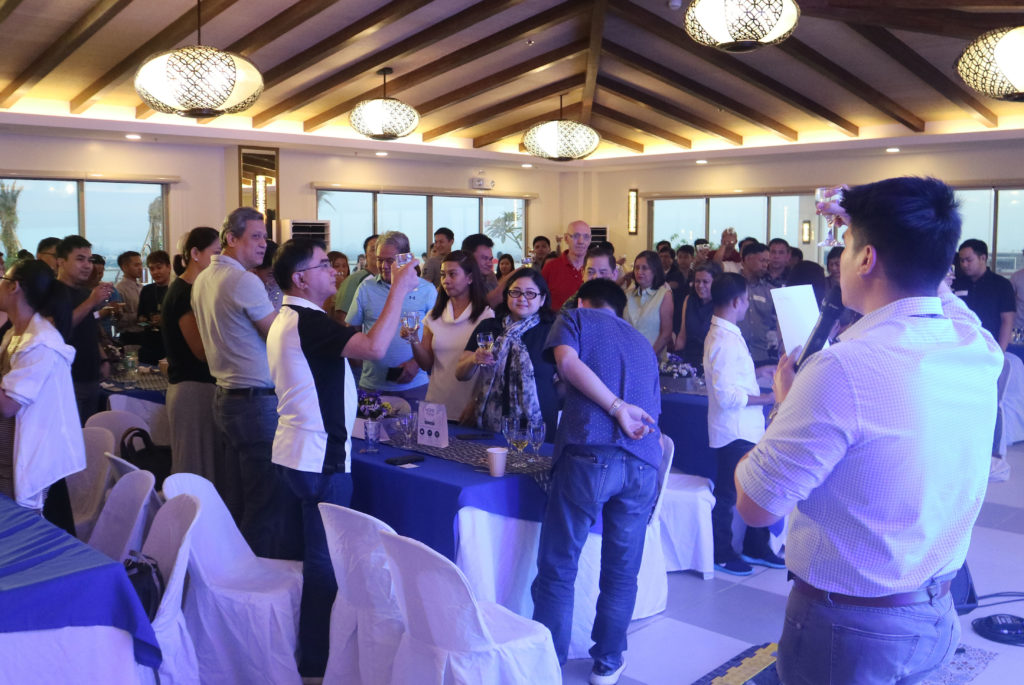 A toast to new beginnings in the homeowners’ new homes.