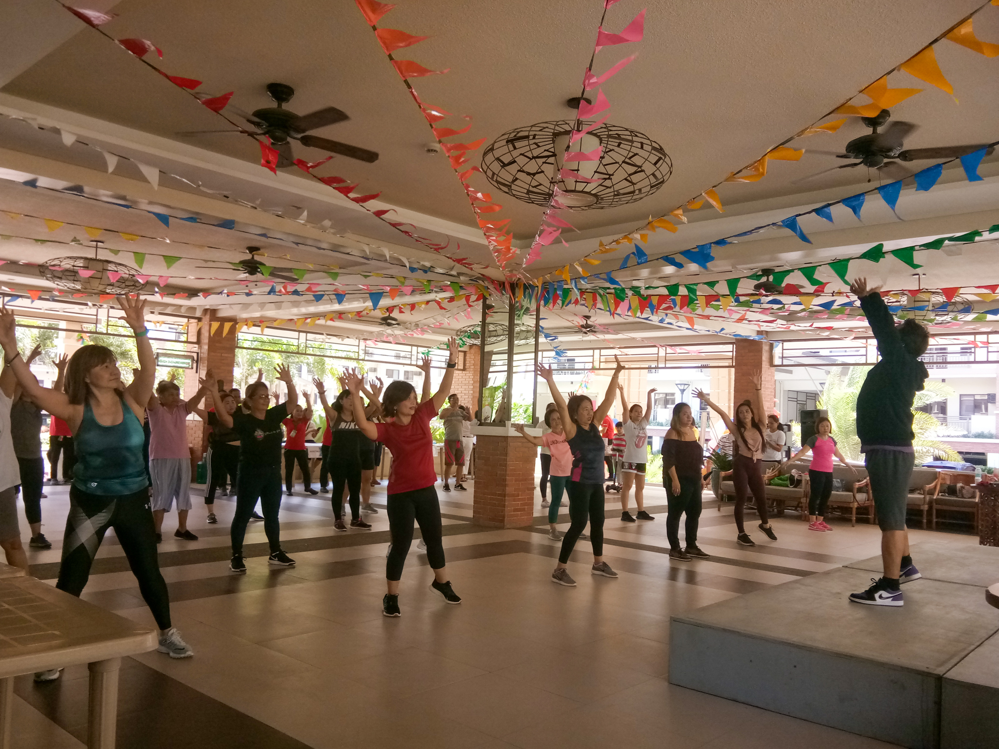 A group of women dancing to Zumba