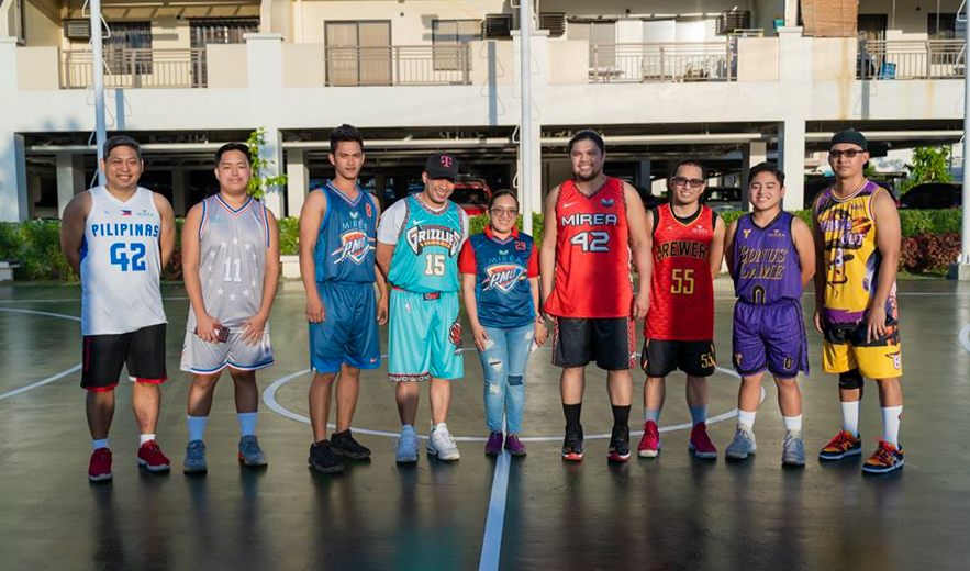 The team captains of the basketball teams together with the Property Manager of Miréa Residences. 