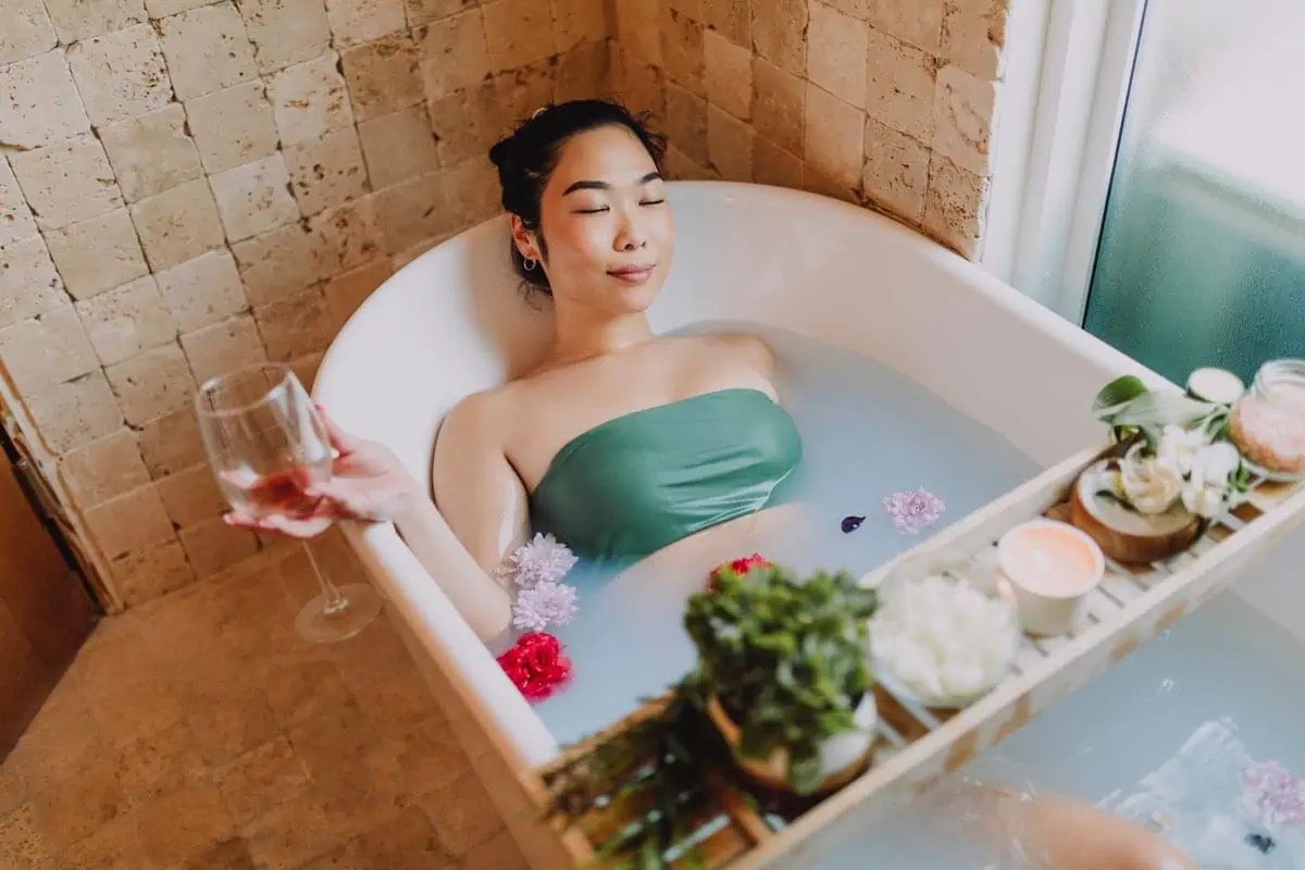 Woman Pampering Herself in Bathtub