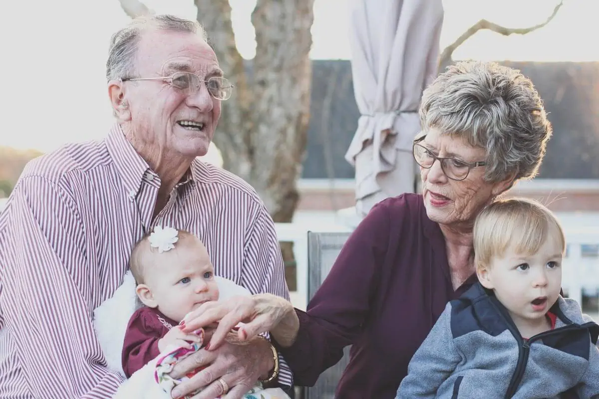 grandparents with their grand kids