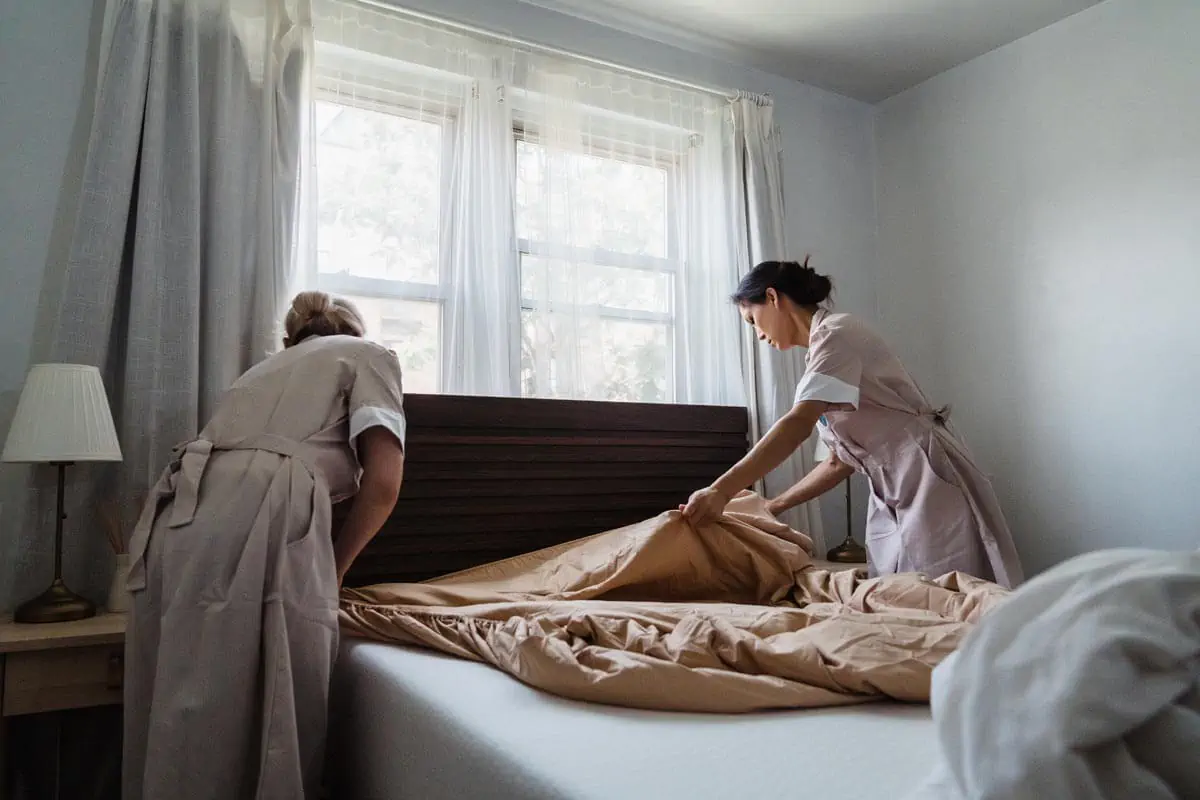 maids cleaning room