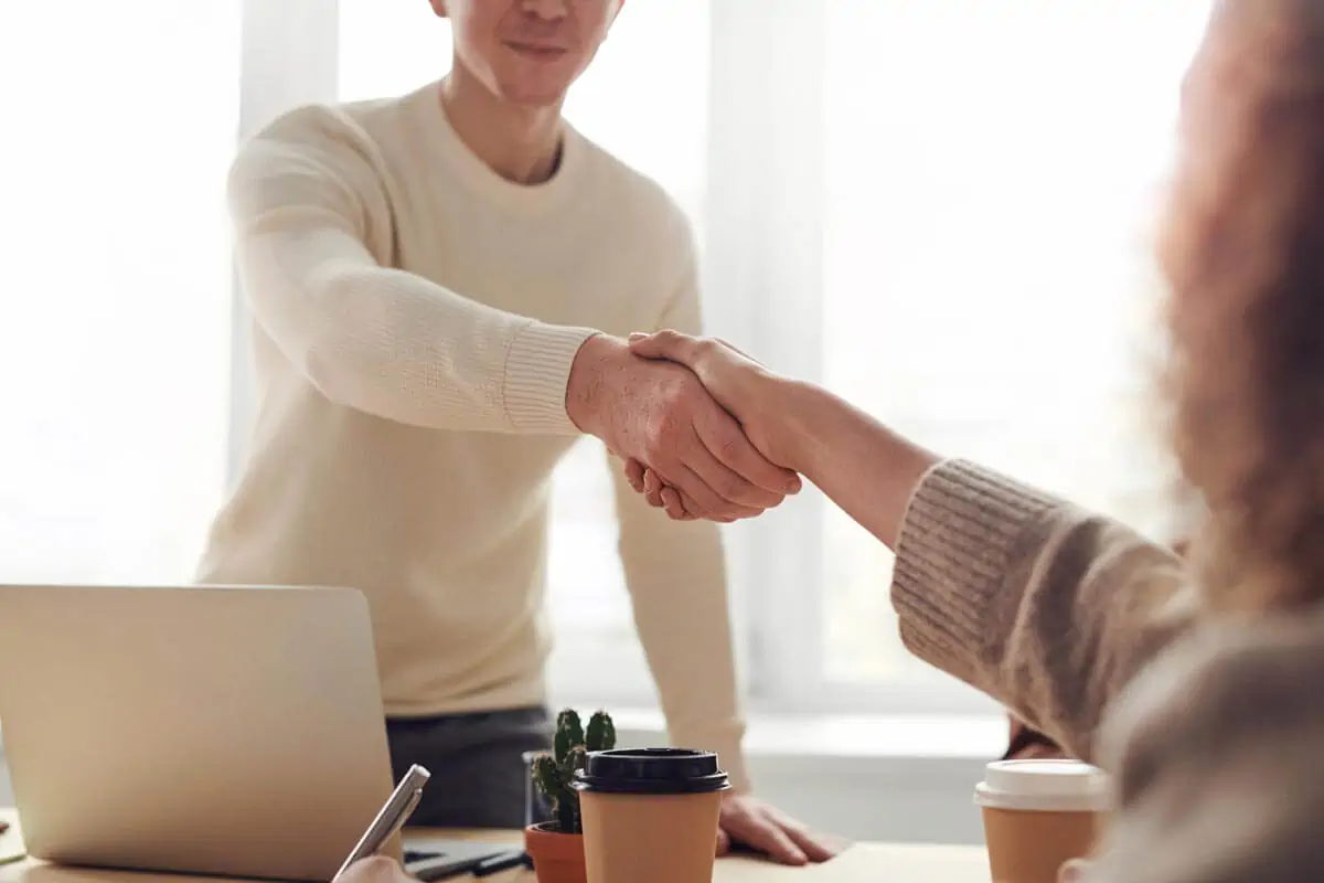 shake hands of two people