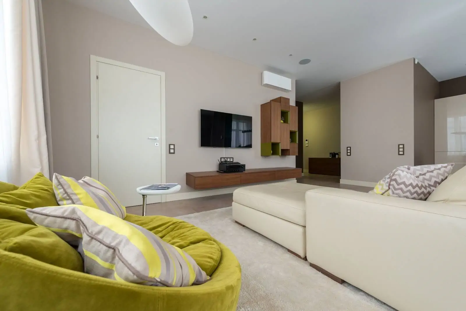 spacious living room with couch and tv
