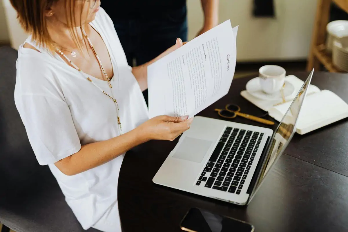 woman holding contract
