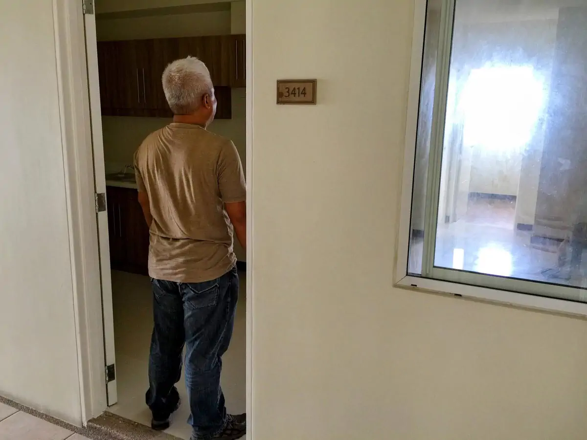 old man standing in the door