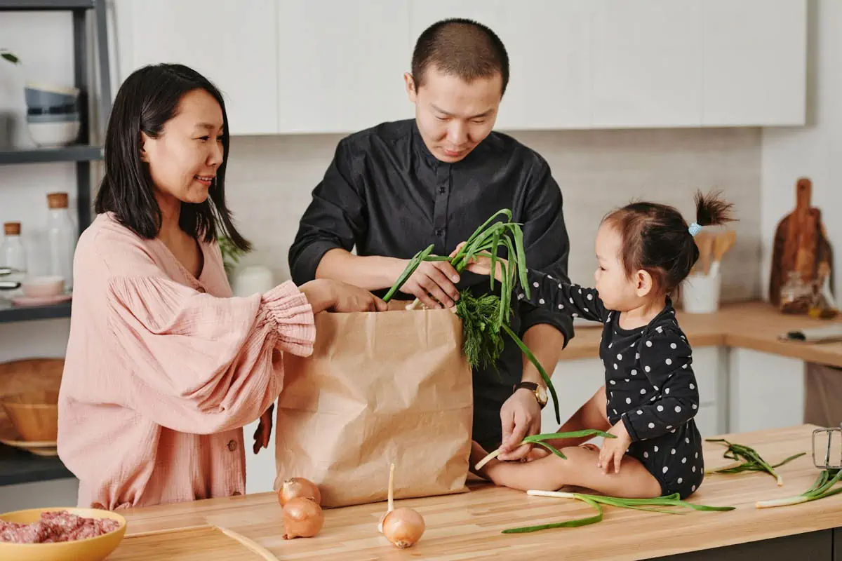 a-family-shopping-for-fresh-vegetables