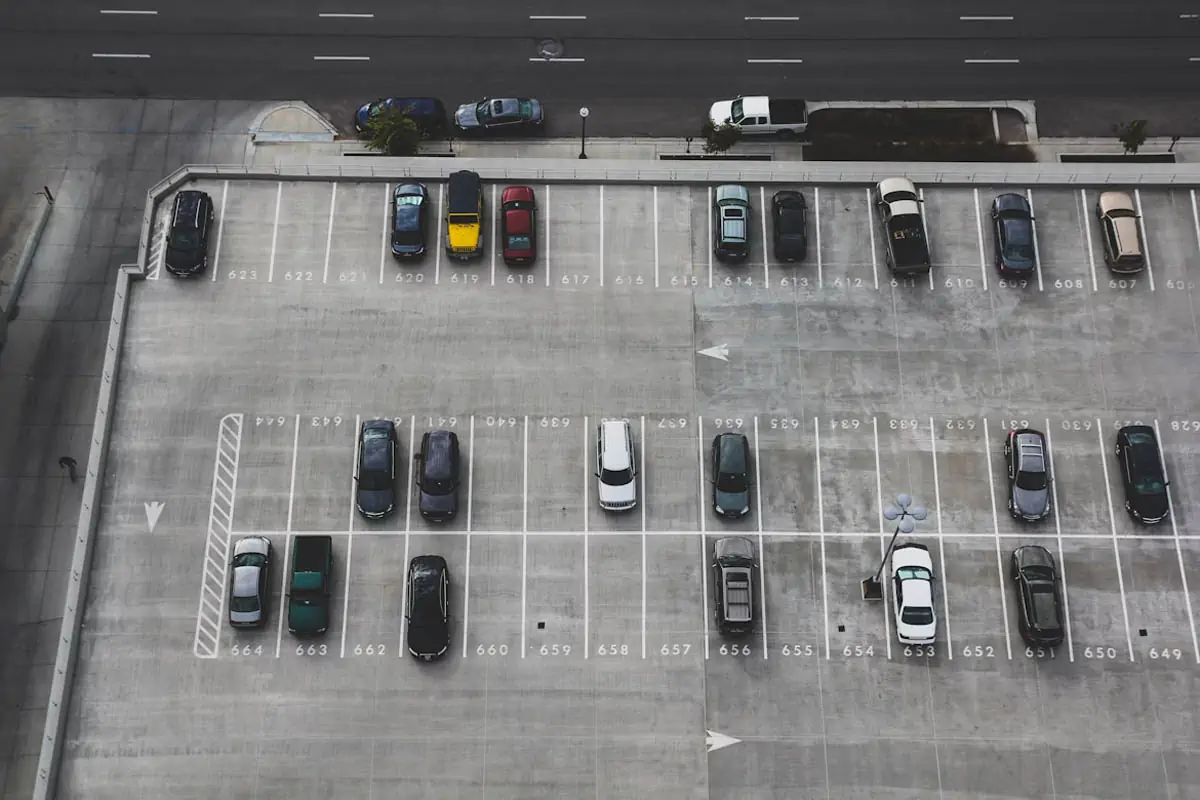 aerial-view-of-cars-parked-on-parking-lot
