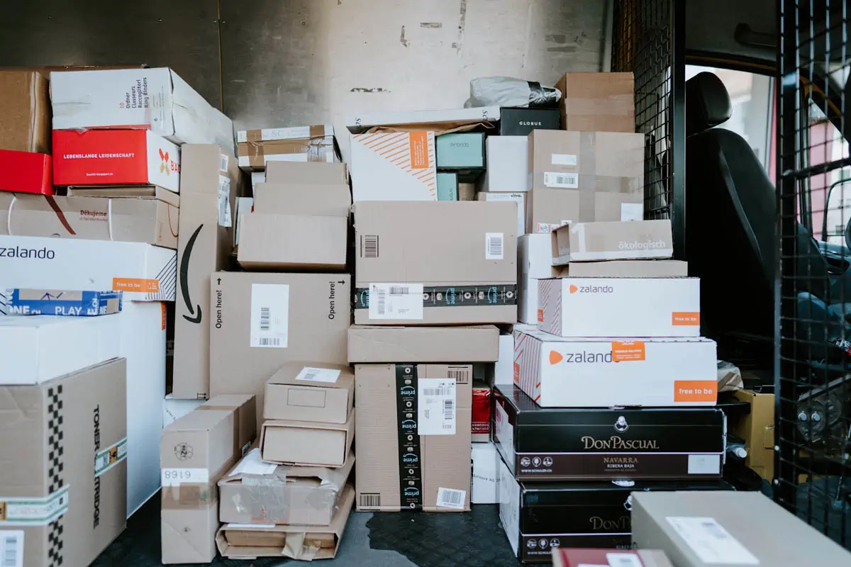 brown-cardboard-boxes-on-black-plastic-crate