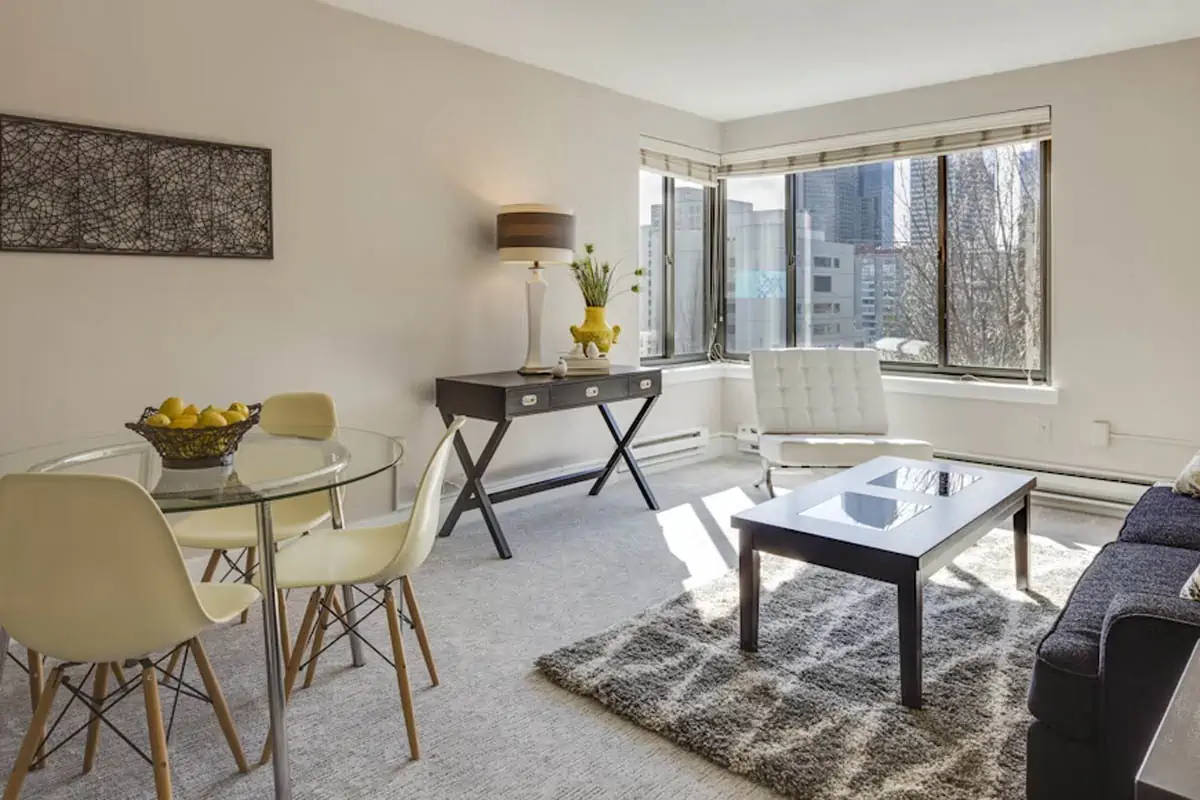 clear-glass-top-table-and-three-chairs