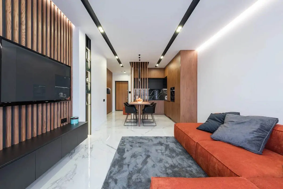 comfy-sofa-in-stylish-apartment-with-living-room-and-kitchen