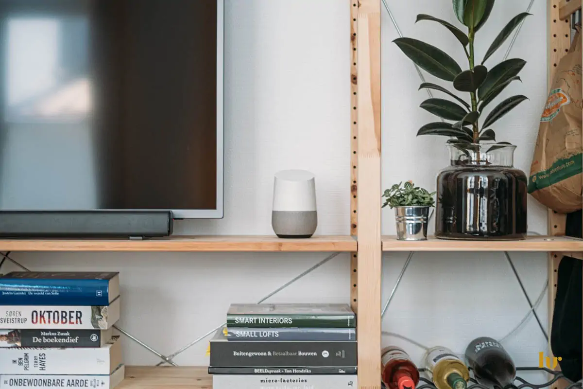 grey-flat-screen-tv-on-brown-wooden-rack