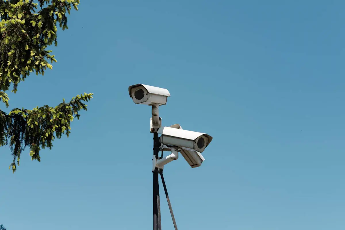 white-and-black-camera-on-tripod